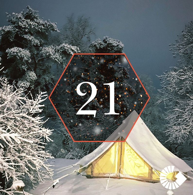 Tält mitt i vinterlandskap, hexagon med siffran 24