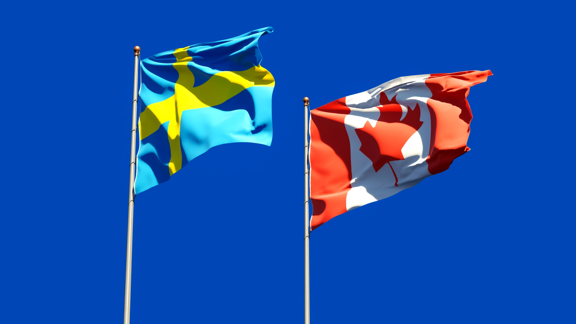 Kanada och Sveriges flagga